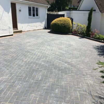Block paving driveway with decorative brick border installed by MUHAJ in St Albans residential property