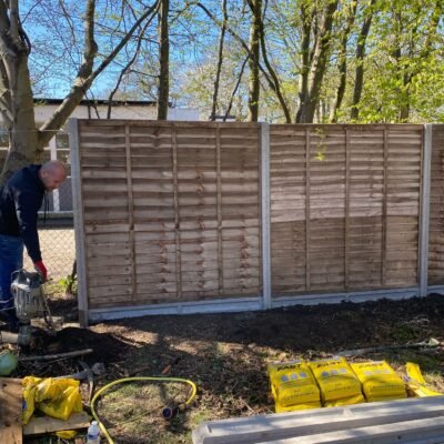 Closeboard fencing installation with concrete posts by MUHAJ team in Edgware garden area