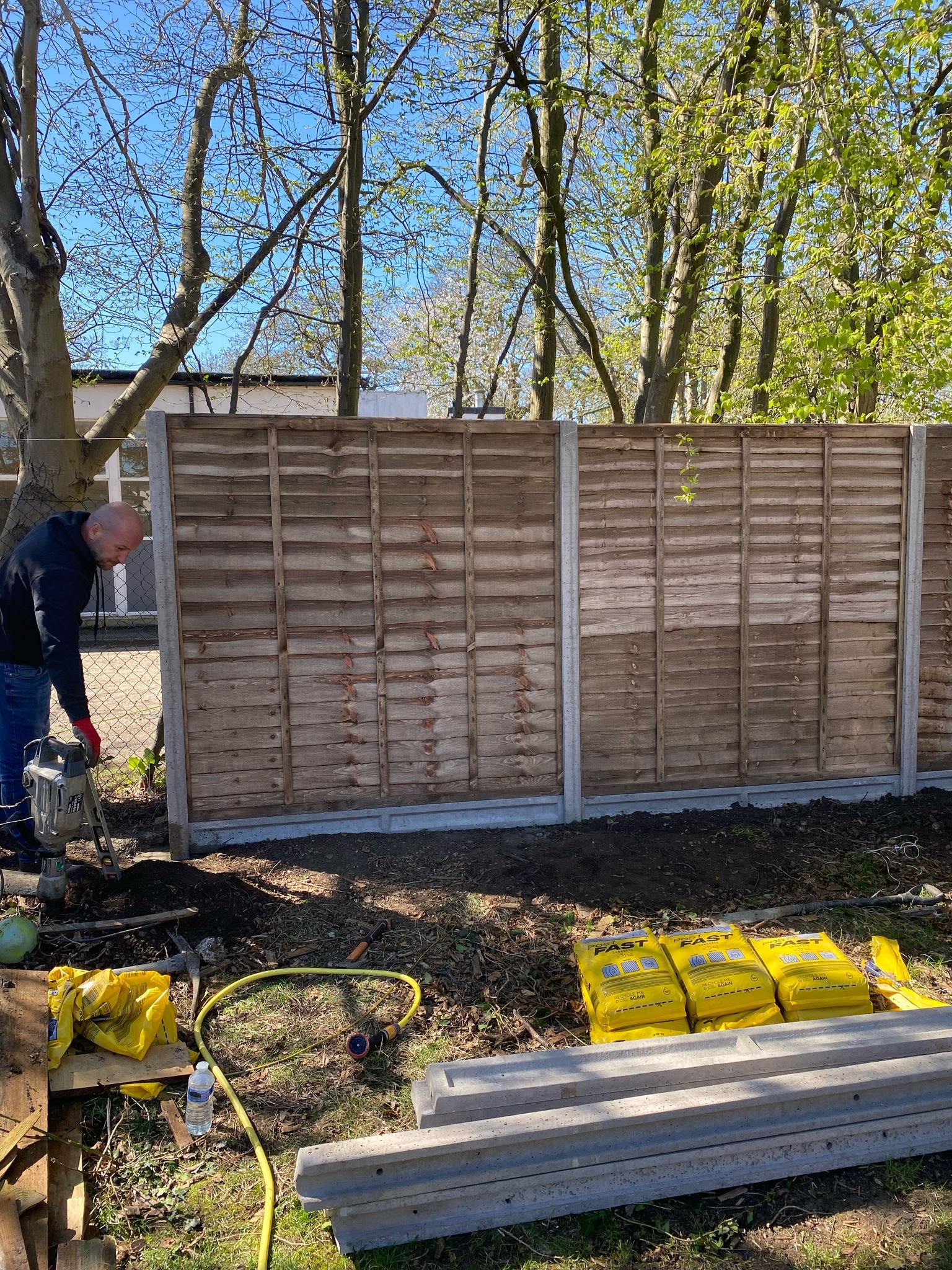 Closeboard fencing installation with concrete posts by MUHAJ team in Edgware garden area