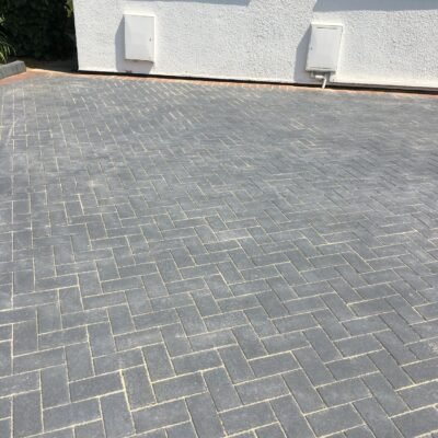 Block paving driveway with decorative brick border installed by MUHAJ in St Albans residential property